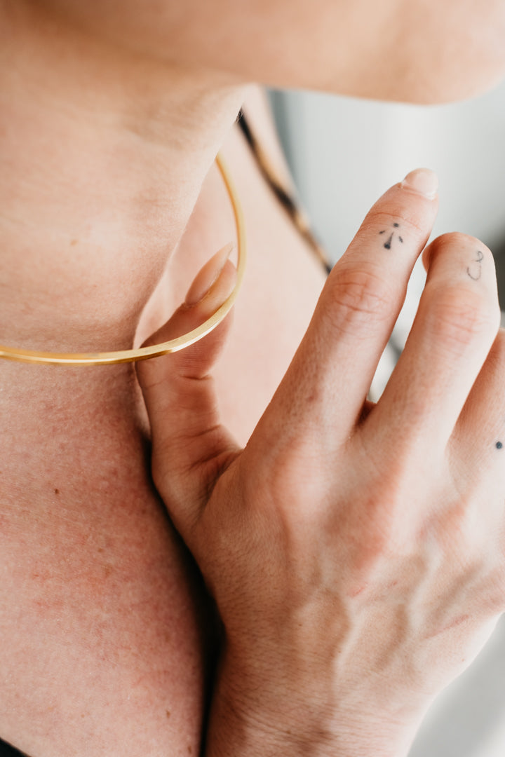 CRUX gold torque necklace